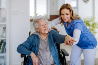 Skilled Nursing Employee Helps Senior Resident